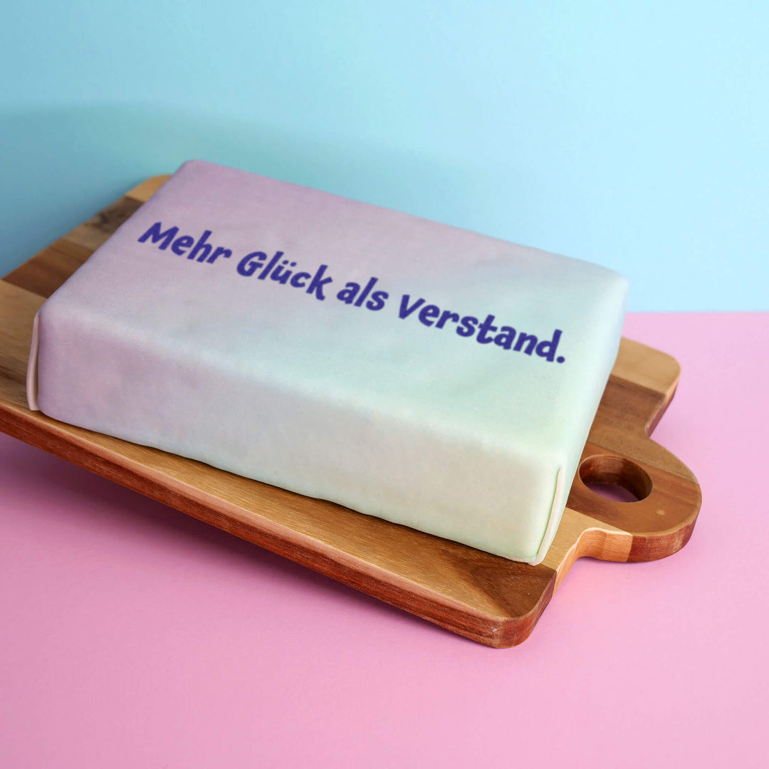 Spruch-Torte "Mehr Glück als Verstand."