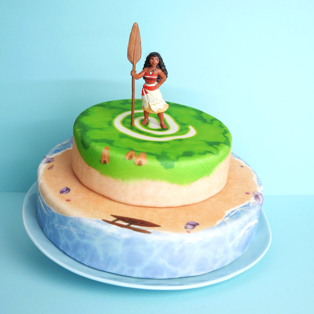 Vaiana® auf zweistöckiger Insel-Torte