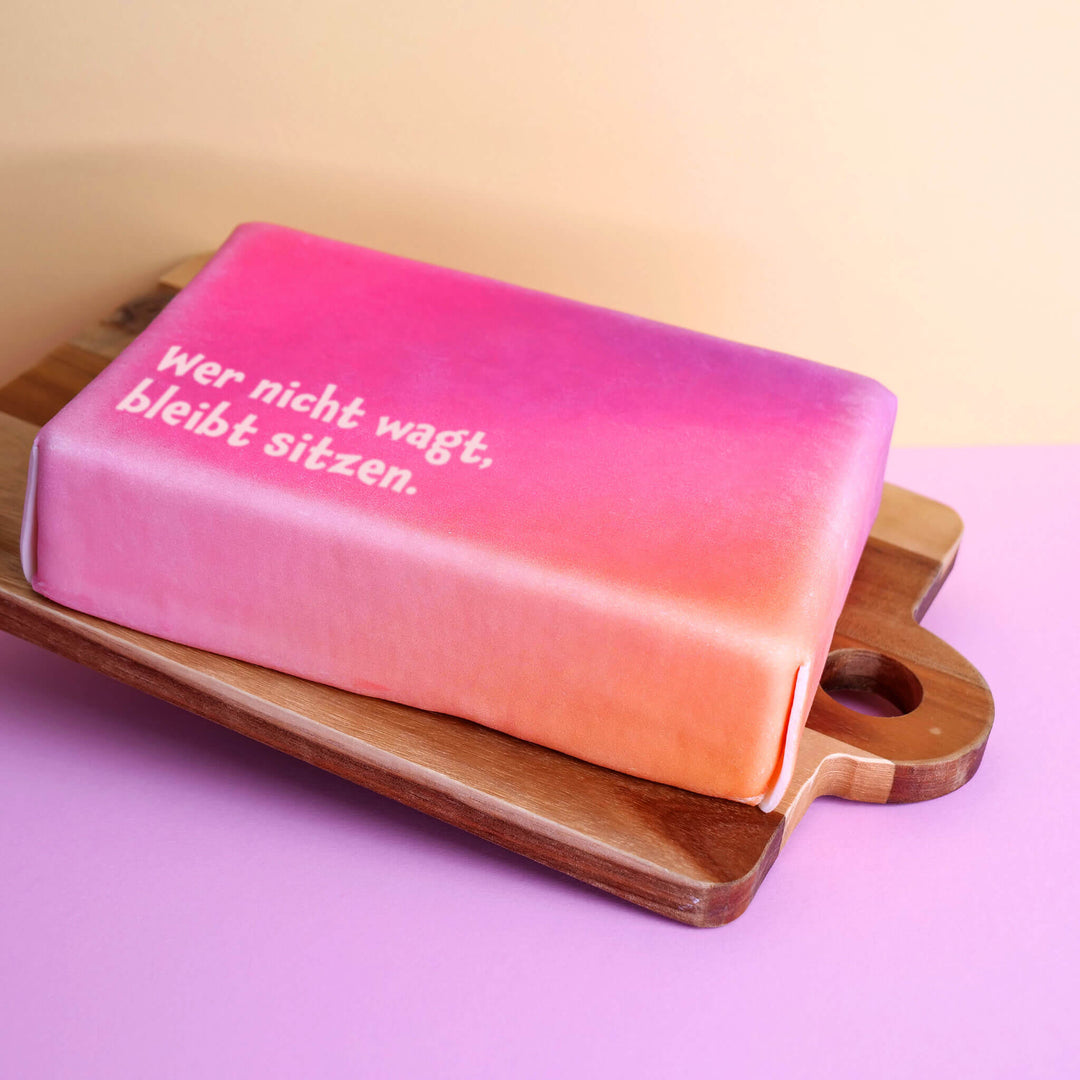 Spruch-Torte "Wer nicht wagt, bleibt sitzen."