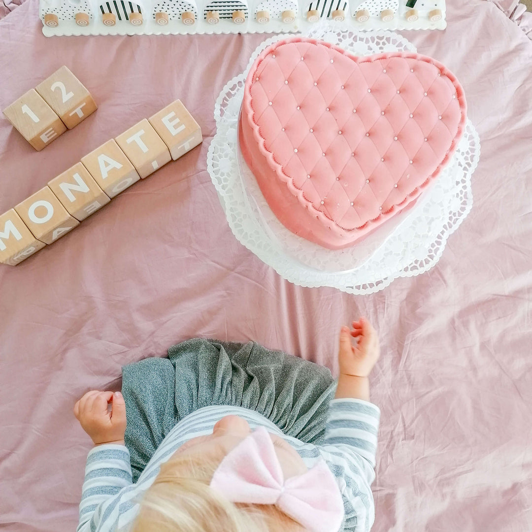 Pinke Deluxe Valentinstagstorte in Herzform - doppelte Höhe