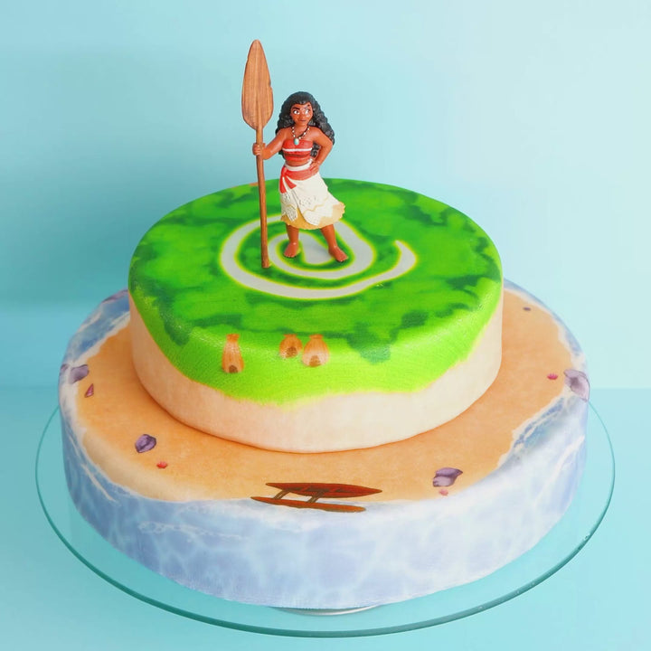 Vaiana® auf zweistöckiger Insel-Torte